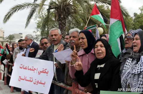 Palestinian women gather for a demonstration calling for the end of the political division between the Gaza Strip Hamas-led leadership and the Palestinian Authority Fatah-led in Gaza city, on Feb. 19, 2013. Photo by Ashr...