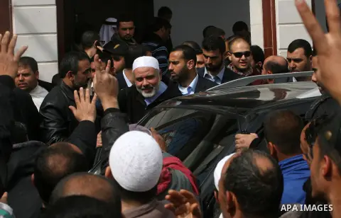 Palestinian Prime Minister in Gaza Ismail Haniyeh greets supporters following Friday prayer in Khan Younis southern Gaza strip on February 22, 2013. Photo by Eyad Al Baba
