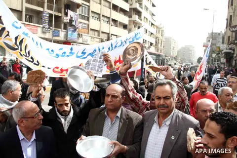 Najeeb Jabraeil, Head of the Egyptian Federation for Human Rights, takes part in a demonstration against the government of President Morsi, at Dawran Shubra near Cairo, Egypt, 22 February 2013. The opposition accuses Mor...
