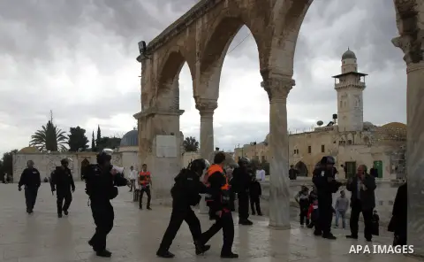 Israeli security forces stand guard during a demonstration following Friday prayers at al-Aqsa mosque in solidarity with prisoners on hunger strike in Israeli prisons, in Jerusalem's old city on February 21, 2013. Some 8...