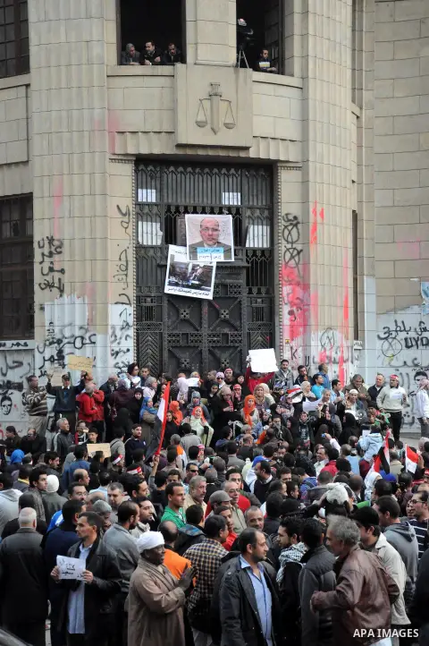 Egyptian protestors shout slogans against Egypt's President and attorney General's during an anti-government demonstration in front of attorney General's Office on February 22, 2013. On almost every Friday -- the first d...