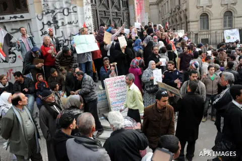 Egyptian protestors shout slogans against Egypt's President and attorney General's during an anti-government demonstration in front of attorney General's Office on February 22, 2013. On almost every Friday -- the first d...