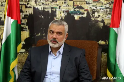 Palestinian Prime Minister in Gaza strip Ismail Haniyeh, receives delegation of the preachers and Egyptian scientists, in Gaza city, on Feb. 23, 2013. Photo by Ashraf Amra
