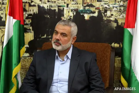 Palestinian Prime Minister in Gaza strip Ismail Haniyeh, receives delegation of the preachers and Egyptian scientists, in Gaza city, on Feb. 23, 2013. Photo by Ashraf Amra
