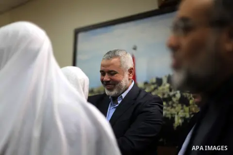 Palestinian Prime Minister in Gaza strip Ismail Haniyeh, receives delegation of the preachers and Egyptian scientists, in Gaza city, on Feb. 23, 2013. Photo by Ashraf Amra