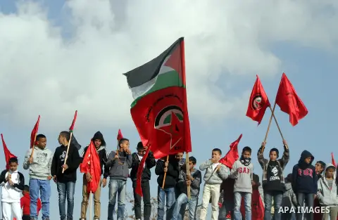 Supporters of the Palestinian Democratic Front protest in solidarity with Palestinian prisoners held in Israeli jails in Jerusalem on Feb. 23, 2013. . Photo by Mahfouz Abu Turk