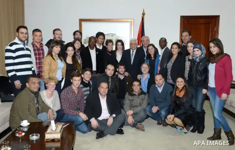 Palestinian President Mahmoud Abbas (Abu Mazen) meets with delegation from the International Union of Socialist Youth in the West Bank city of Ramallah, on Feb. 23, 2013. Photo by Thaer Ganaim