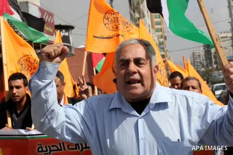Palestinians take part in a protest against the death of a Palestinian detainee in an Israeli jail, in Gaza City February 24, 2013. Palestinian officials on Saturday demanded an international investigation into the death...