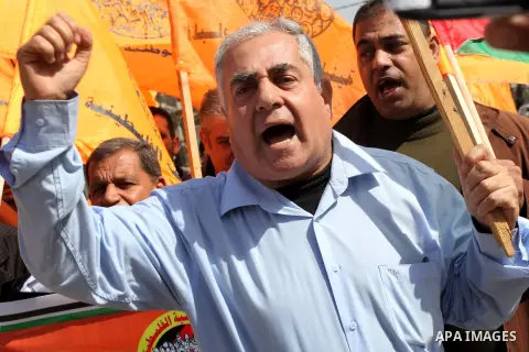 Palestinians take part in a protest against the death of a Palestinian detainee in an Israeli jail, in Gaza City February 24, 2013. Palestinian officials on Saturday demanded an international investigation into the death...
