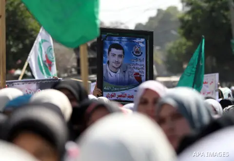 Palestinian women take part in a protest against the death of a Palestinian detainee in an Israeli jail, in Gaza City February 24, 2013. Palestinian officials on Saturday demanded an international investigation into the...