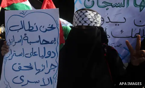 Palestinian women take part in a protest against the death of a Palestinian detainee in an Israeli jail, in Gaza City February 24, 2013. Palestinian officials on Saturday demanded an international investigation into the...