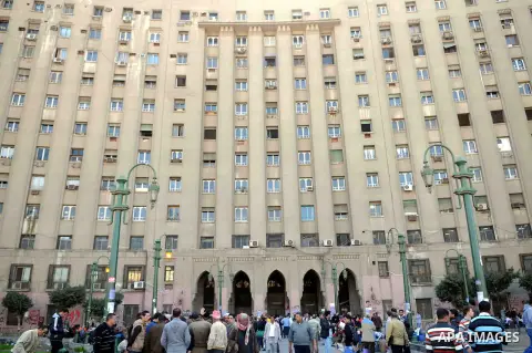 Egyptian protesters gather in front of Cairo's main administrative building on February 24, 2013, as they closed its doors part of a growing campaign of civil disobedience around the country. A group of protesters closed...