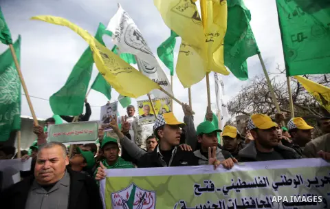 Palestinians take part in a protest against the death of a Palestinian detainee in an Israeli jail, in Gaza City February 25, 2013. Palestinian officials on Saturday demanded an international investigation into the death...