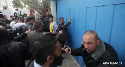 Palestinians take part in a protest against the death of a Palestinian detainee in an Israeli jail, in front of the headquarters of the United Nations in Gaza City February 25, 2013. Palestinian officials on Saturday dem...