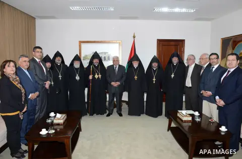 Palestinian President Mahmoud Abbas (Abu Mazen) meets with Armenian Patriarch in Jerusalem and Jordan the Patriarch Norhan Mnoggion in the West Bank city of Ramallah, on Feb. 28, 2013. Photo by Thaer Ganaim