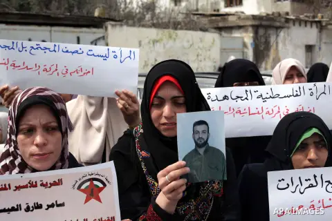 Palestinian women attend a protest calling for the release of Palestinian prisoners from Israeli jails in Gaza City on March 07, 2013 during a rally for the International Women's Day which is celebrated worldwide on Marc...