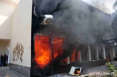 Egyptian al-Ahly football club supporters (Ultras) burn a Union Koura in Cairo on March 9, 2013, after an Egyptian court upheld death sentences for 21 defendants over a deadly football riot in Port Said that killed 74 pe...