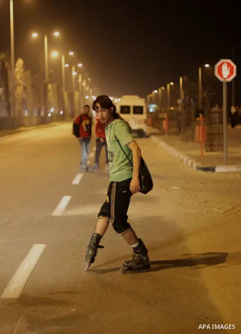 Members of a Palestinian youth skate team show their technique during training in Gaza city on March 8, 2013. Photo by Ezz al-Zanoon