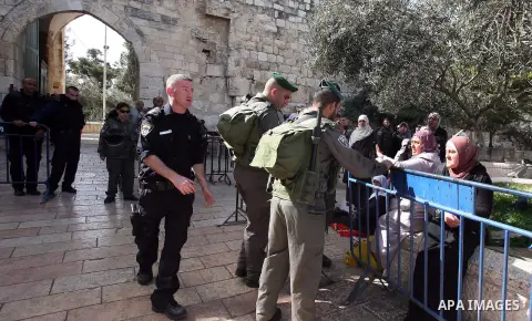 Israeli soldiers prevent Palestinian women to enter the al-Aqsa mosque compounds from the Lions Gate, in Jerusalem's old city on march 11 2013. Photo by Mahfouz Abu Turk