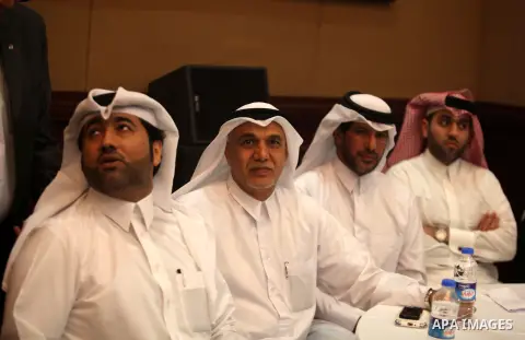 Palestinian Minister of Works and Housing in Gaza strip Yousef al-Ghrez, and Qatari ambassador Mohammed al-Emadi (not seen), attend the signing ceremony of agreement to start building the project of Hamad ben Khalifa cit...