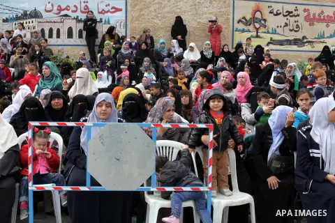 Palestinians attend a police graduation ceremony at a police academy in Gaza City March 19, 2013. Photo by Ashraf Amra