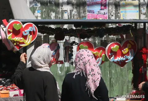 Palestinian vendor display a His goods in ''Mother's Day'' in Rafah southern Gaza Strip, Mar. 20, 2013. Photo by Eyad Al Baba