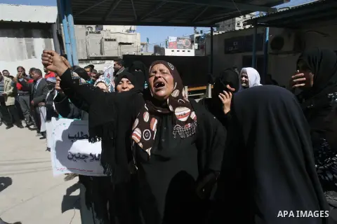 Palestinians take part in a protest against the reduction of some of the financial and food aid services given by the United Nations Relief and Works Agency (UNRWA) to Palestine refugees, in Rafah in the southern Gaza St...
