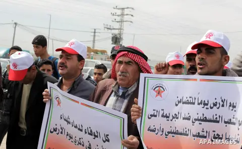 Palestinians take part in a rally marking Land Day in Beit Hanun in the northern Gaza Strip on March 30, 2013. Land Day commemorates the death of six Arab Israeli protesters at the hands of Israeli troops during mass pro...