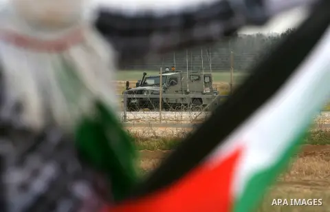 Palestinians take part in a rally marking Land Day in Rafah, southern Gaza Strip on March 30, 2013. Land Day commemorates the death of six Arab Israeli protesters at the hands of Israeli troops during mass protests in 19...
