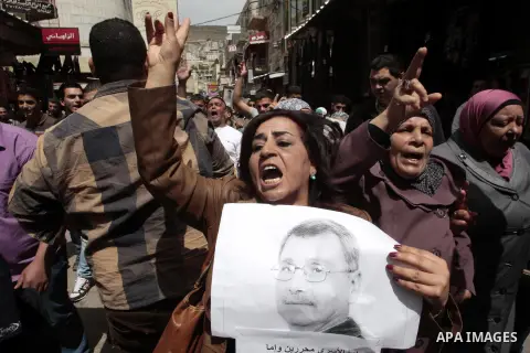 Palestinians take part a protest in the West Bank city of Nablus, 02 April 2013, after the news of the death of Maysara Abu Hamdiyeh in the Israeli Soroka hospital. Reports state that Maysara Abu Hamdiyeh died after bein...