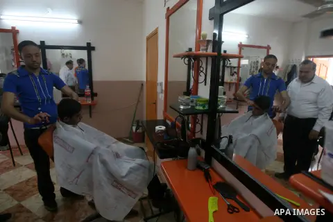 Palestinian youths attend lesson of the hairdressing beauty at The Adam Training Academy, in Rafah town in the southern Gaza Strip on Apr. 06, 2013. Photo by Eyad Al Baba