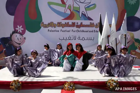 Palestinian children take part in a celebration to mark the International Children Day in Gaza city on April, 07, 2012. Photo by Ashraf Amra