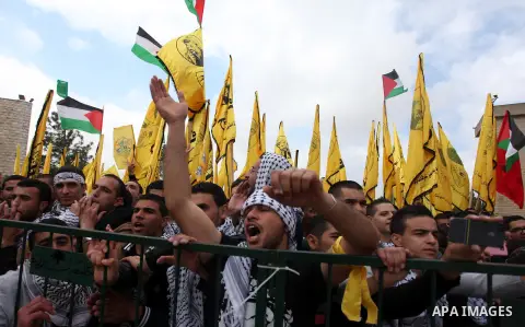 Palestinian students from Birzeit University attend the election debate between students blocs competing in the University student council elections, in the West Bank city of Ramallah on April 09, 2013. Photo by Issam Ri...