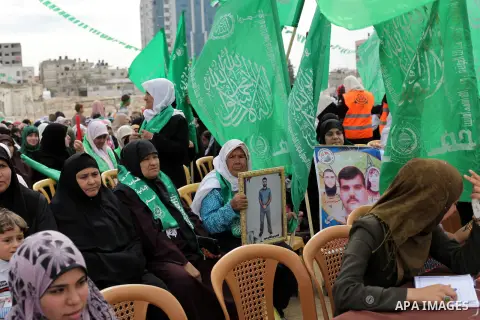 Palestinian women and children take part in a rally next to a prison in Gaza City that had been used by Israeli security services to keep Palestinian prisoners during Israel's occupation of Gaza Strip April 11, 2013. A H...