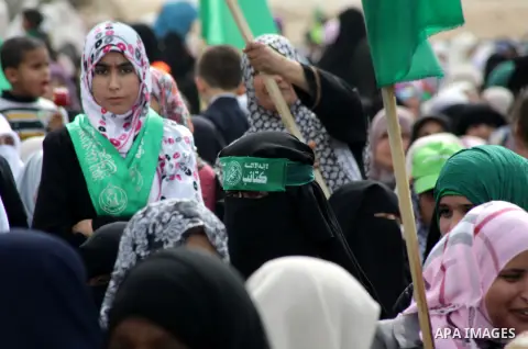 Palestinian women and children take part in a rally next to a prison in Gaza City that had been used by Israeli security services to keep Palestinian prisoners during Israel's occupation of Gaza Strip April 11, 2013. A H...
