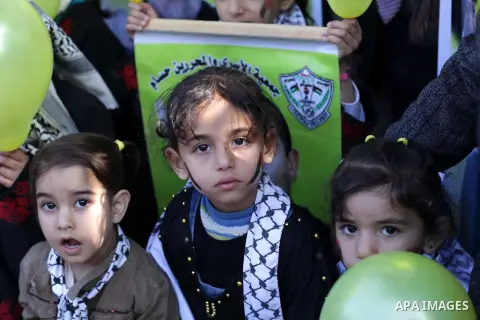 Palestinian children take part a protest in front of the Red Cross offices in Gaza city, on Apr. 15, 2013 in solidarity with Palestinian prisoners held by Israel to demand their release from detention without trial. Phot...