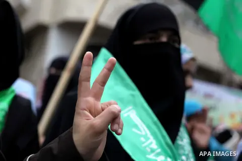Palestinian women take part in a rally marking Palestinian Prisoners Day in Gaza City April 17, 2013. According to a Palestinian prisoners' association, at least 4,900 Palestinians remain in Israeli jails. Photo by Ashra...