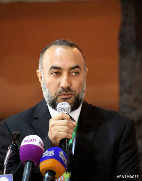 Palestinian Hamas Internal Security officer, Zaki Sharaf, speaks during a meeting to awareness the Palestinian community against the collaborating with Israel, in Gaza City, Apr. 18, 2013. Photo by Ashraf Amra