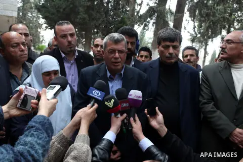 Palestinian Minister of prisoners Issa Qaraqe gives a press speech following release the prisoner Mohammed al-Taj in the West Bank city of Ramallah, on April 18, 2013. al-Taj has served until now about two-thirds of his...