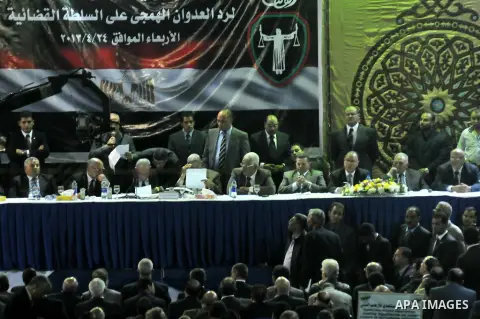 Head of the Judges Club Egypt Ahmad Al-Zend take part a meeting for the General Judges Association in Cairo in support of the Egyptian Judiciary and against the country's President Mohamed Morsi on April 24, 2013. Photo...