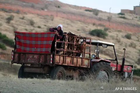 Bedouins load belongings into the back of a pick-up truck as he and his family leave their home in the West Bank village of Wadi al-Maleh, near the border with Jordan April 29, 2013. Israeli soldiers on Monday evicted se...