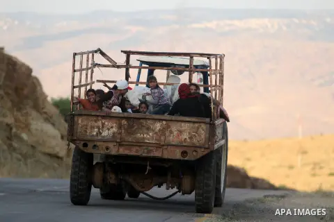 Bedouins load belongings into the back of a pick-up truck as he and his family leave their home in the West Bank village of Wadi al-Maleh, near the border with Jordan April 29, 2013. Israeli soldiers on Monday evicted se...