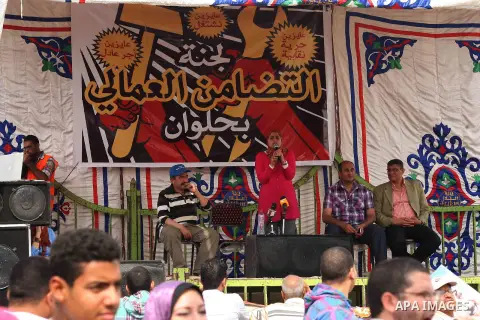 Egyptian workers attend a ceremony marking May Day in Helwan near Cairo, on May 03, 2013. Photo by Tareq Gabas