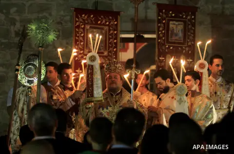 Palestinian Orthodox celebrate Holy Fire ceremony at the Saint Porfirios church in Gaza City early Gaza City May 05, 2013. Photo by Naaman Omar