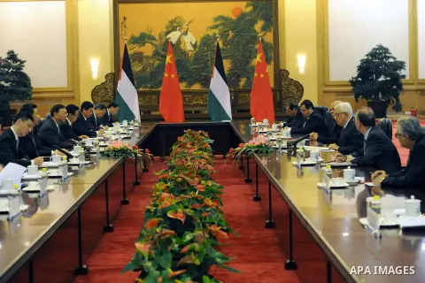 Palestinian President Mahmoud Abbas (Abu Mazen) meets with Chinese President Shi Bing gene and the signing of cooperation agreements in Beijing in China, on May 6, 2013. Photo by Thaer Ganaim