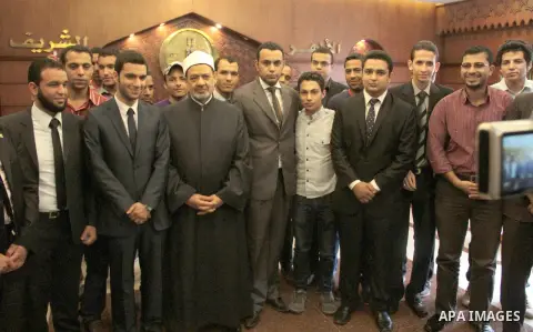 Ahmed Al-Tayeb Sheikh of Al-Azhar meets with Egyptian students to discuss the issue of food poisoning for students, in Cairo, on May 8, 2013. Some 540 students from Egypt's Al-Azhar University were hospitalized with food...