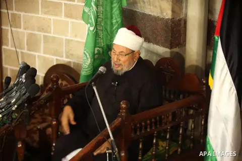 Egyptian Cleric and chairman of the International Union of Muslim Scholars Sheikh Yusuf al-Qaradawi, speaks during Friday prayers at al-Umari mosque in Gaza city May 10, 2013. Al-Qaradawi arrived to Gaza Strip on May 8 f...
