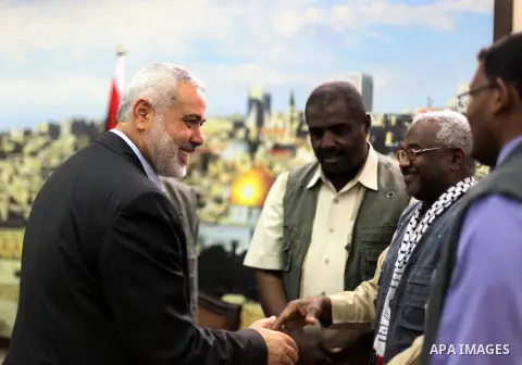 Palestinian Prime Minister in the Gaza Strip Ismail Haniyeh meets with Sudanese delegation in his house in Gaza City on May 12, 2013. Photo by Ashraf Amra