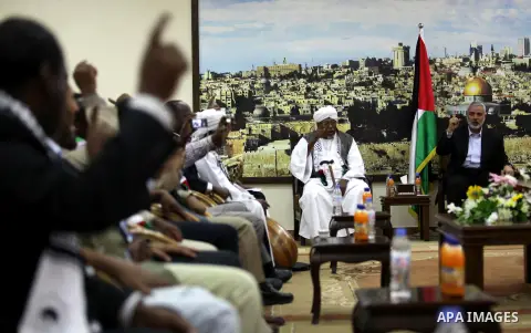Palestinian Prime Minister in the Gaza Strip Ismail Haniyeh meets with Sudanese delegation in his house in Gaza City on May 12, 2013. Photo by Ashraf Amra