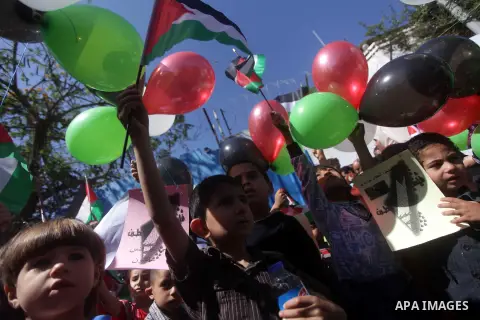 Palestinian children take part in a rally ahead of Nakba Day in front of the headquarters of the United Nations (Unrwa) in Gaza city May 15, 2013. Palestinians will mark "Nakba" (Catastrophe) on May 15 to commemorate the...